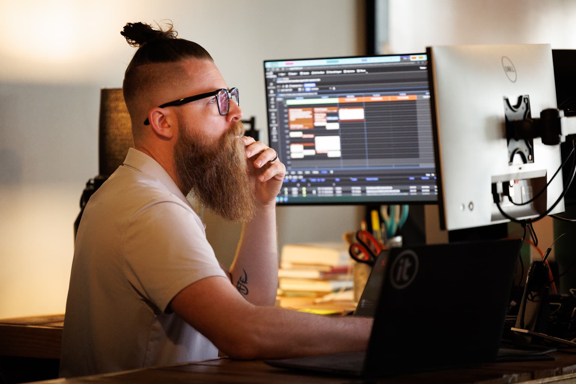 IT engineer reviewing a client support ticket queue