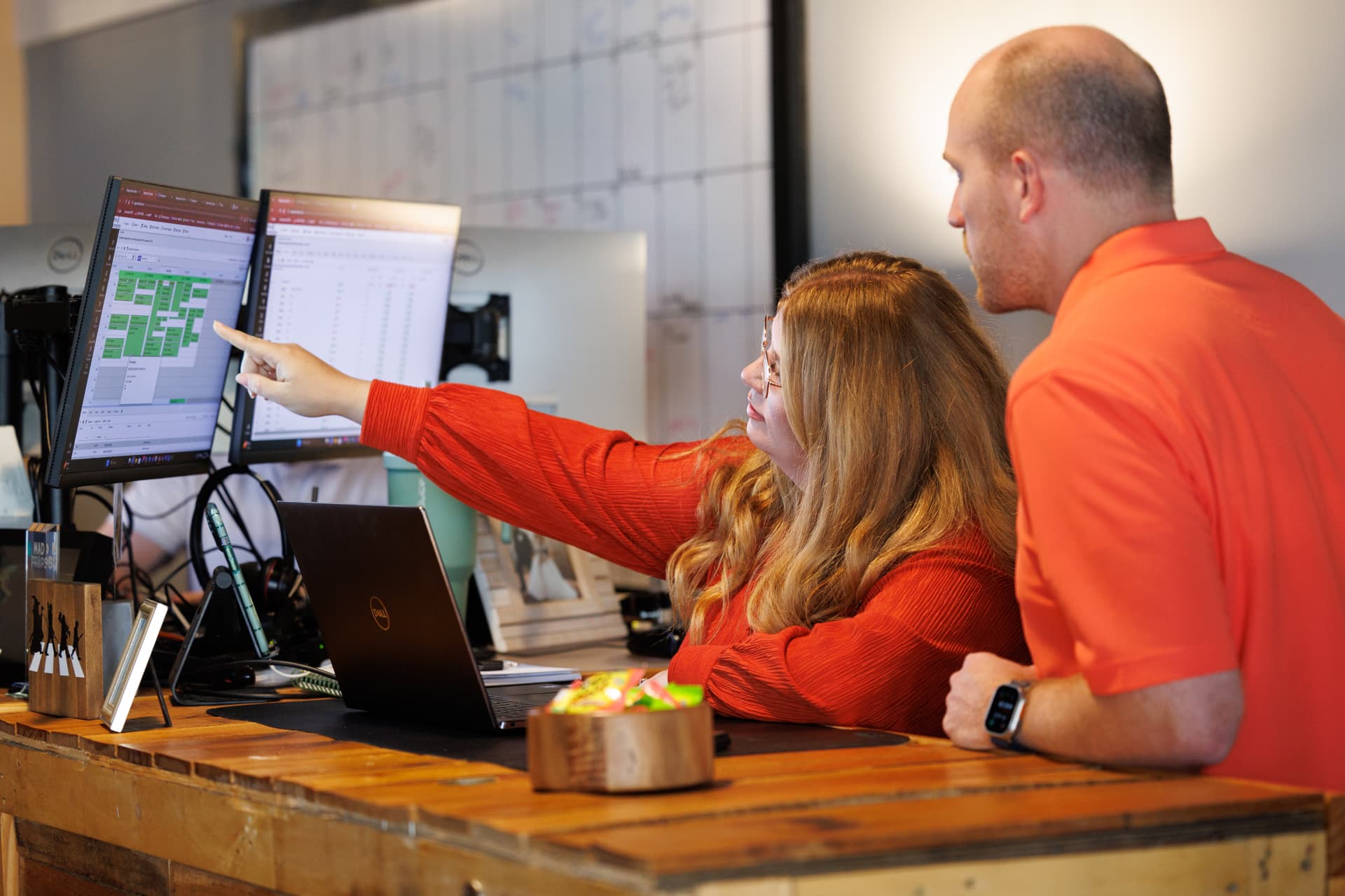 The IT Company engineers reviewing a client's systems together
